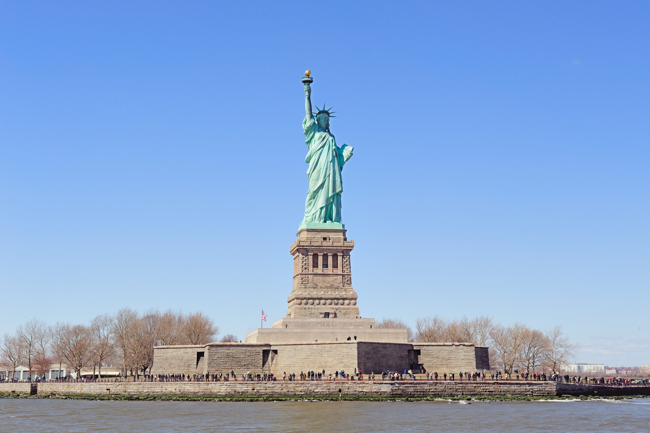 Statue of Liberty on Liberty Island closeup with blue sky in New York City Manhattan