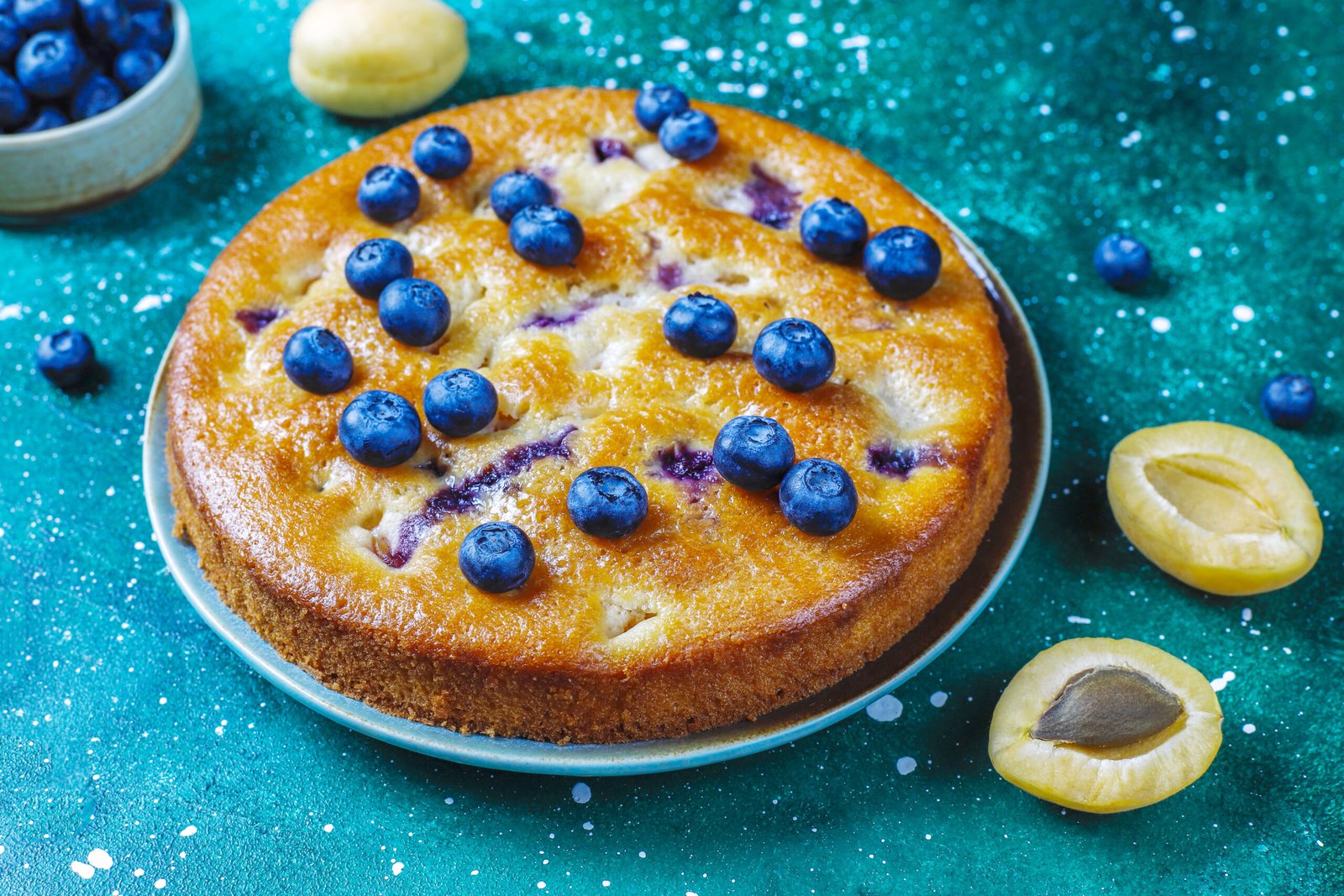 Apricot and blueberry cake with fresh blueberries and apricot fr